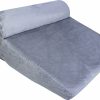 a grey pillow on a white background